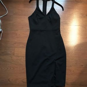 Black fitted midi dress with slit